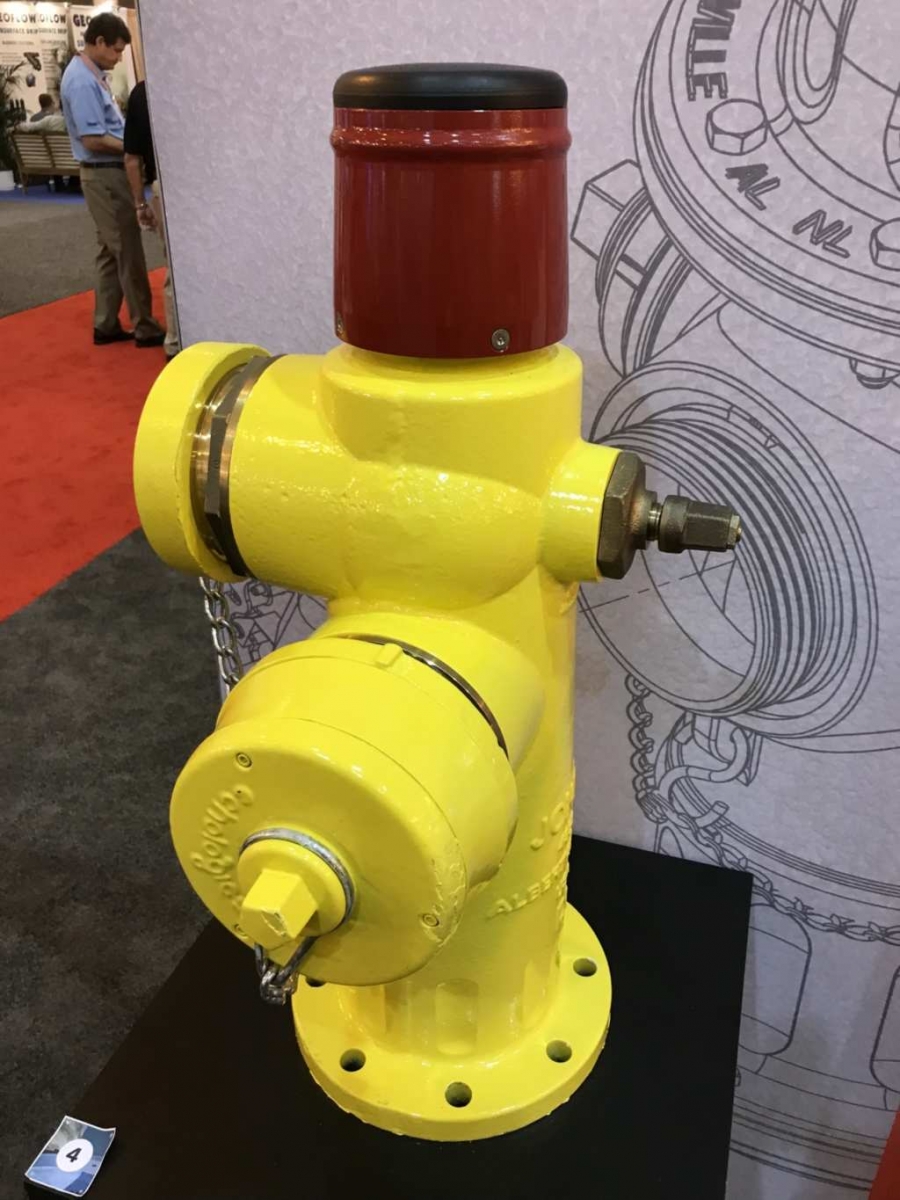 The J-0438 wet-barrel “smart” fire hydrant with a pressure-monitoring dome and a fixed leak-detection cap.